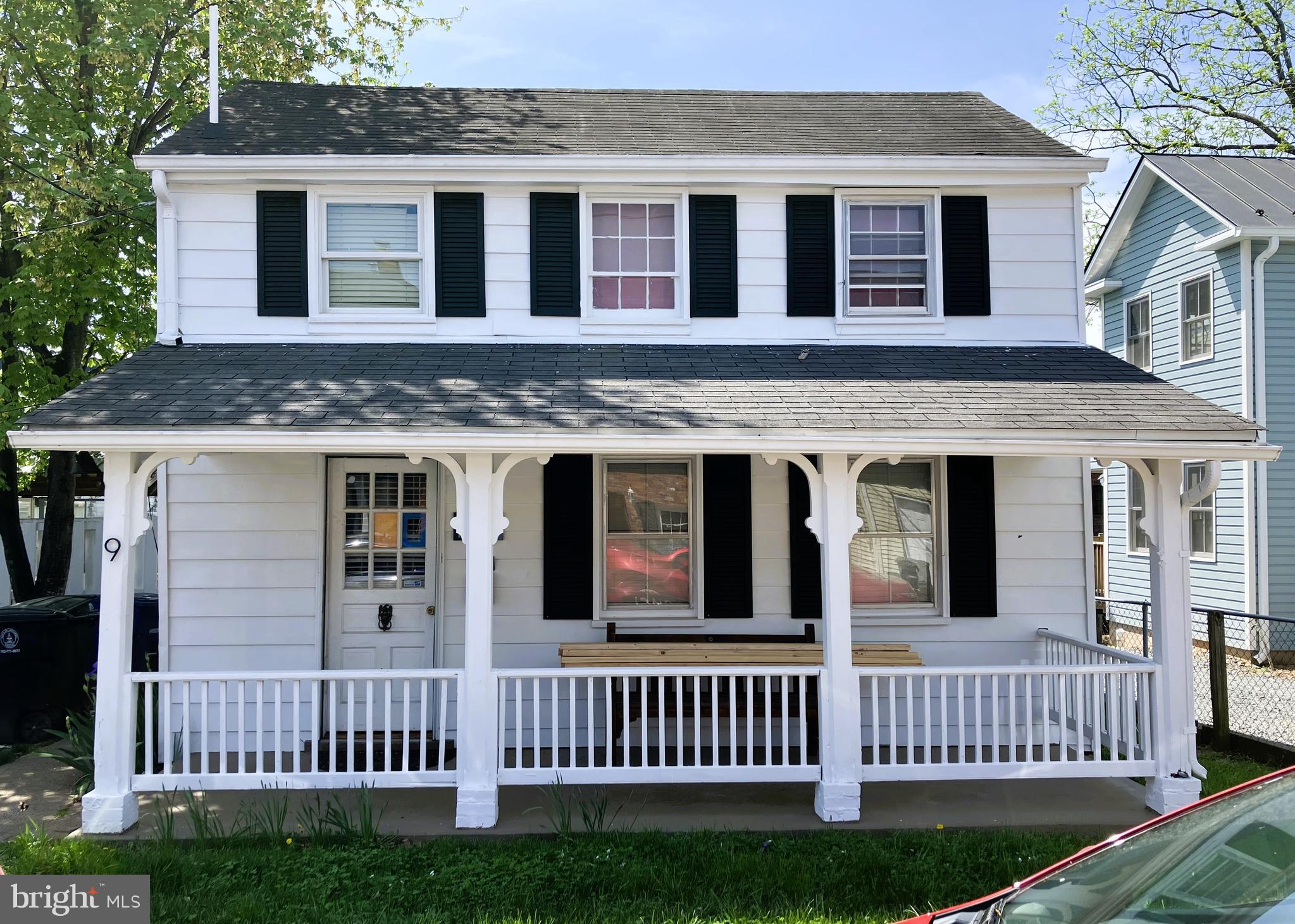 9 Royal Street Southeast Leesburg, VA 20175 - Photo 1 of 4 a front view of a house with a porch