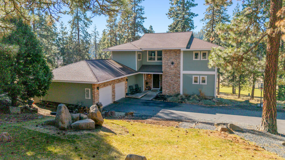 11750 Merganser Road Klamath Falls, OR 97601 - Photo 3 of 66 a front view of a house with a yard balcony and tree