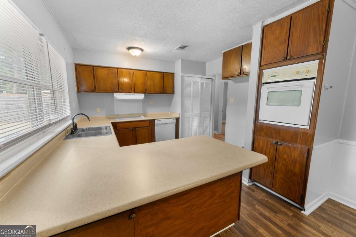 320 West Whatley Street Pooler, GA 31322 - Photo 22 of 34 a bedroom with a bed and a flat screen tv