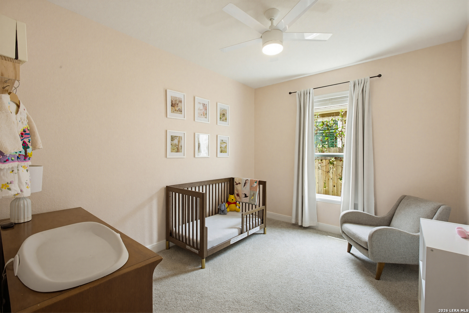 7829 Big Wind Way Austin, TX 78724 - Photo 20 of 26 a living room with furniture and a window