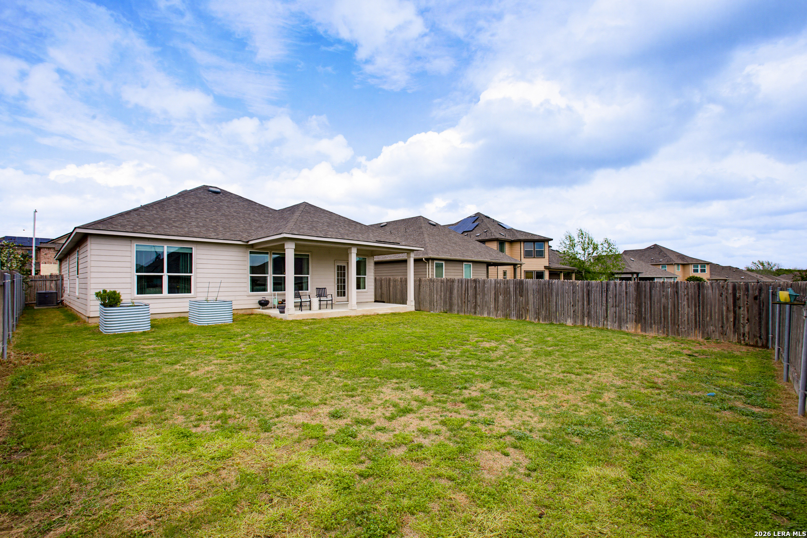 7829 Big Wind Way Austin, TX 78724 - Photo 23 of 26 a view of a yard in front of a house with a yard