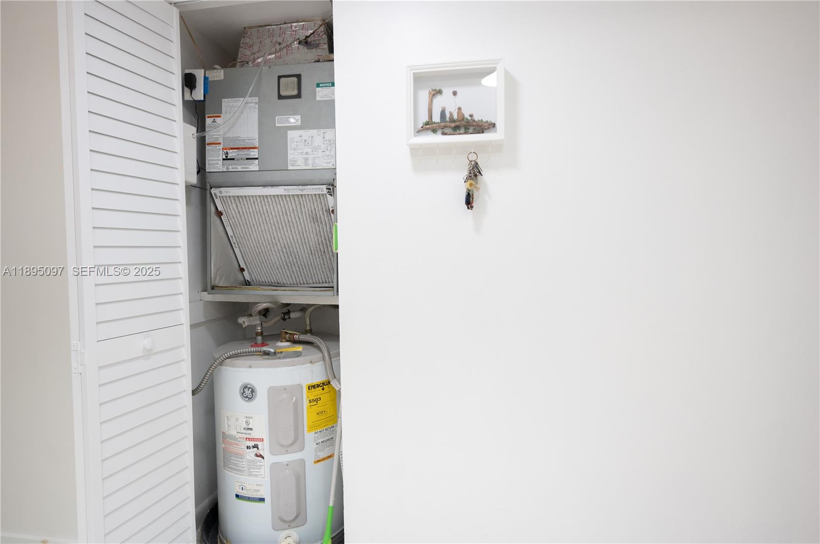 10875 Southwest 112th Avenue, Unit 204 Miami, FL 33176 - Photo 22 of 27 a utility room with dryer and washer