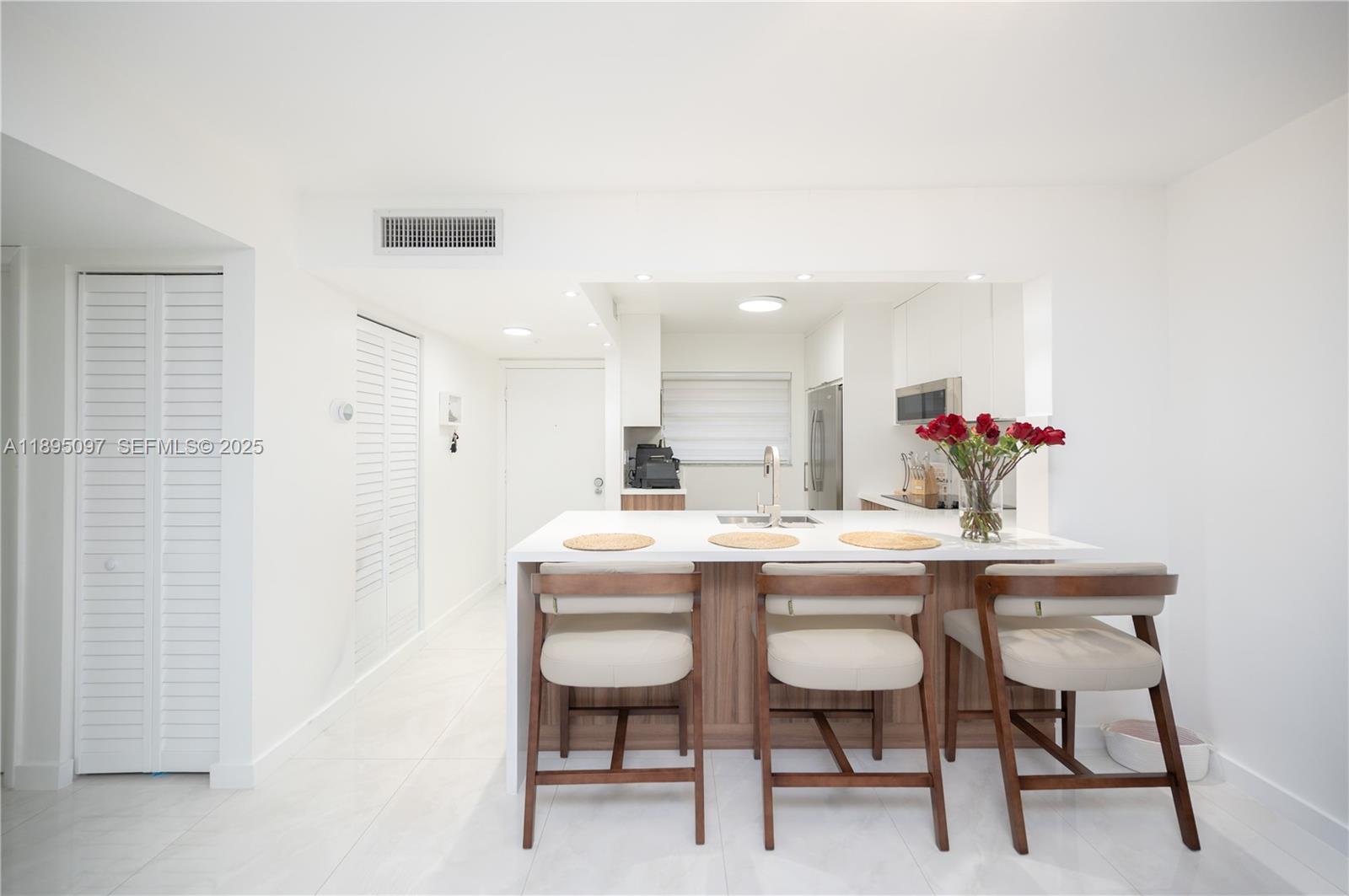 10875 Southwest 112th Avenue, Unit 204 Miami, FL 33176 - Photo 4 of 27 a view of a dining room with furniture