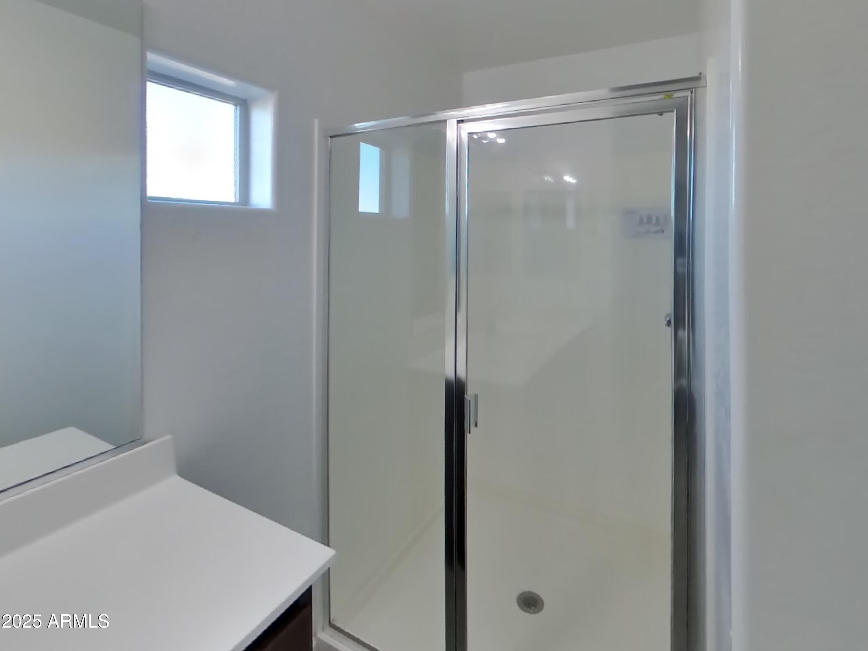 10336 West Devonshire Avenue Phoenix, AZ 85037 - Photo 16 of 18 a bathroom with a bathtub