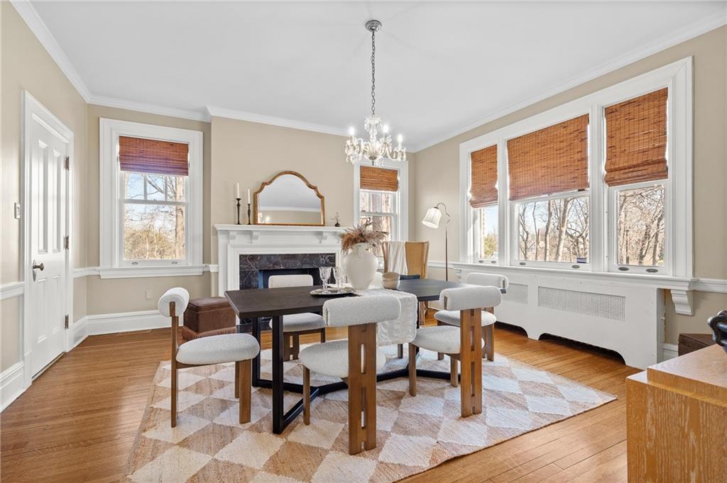 115 Woodland Road Pittsburgh, PA 15232 - Photo 13 of 50 a view of a dining room with furniture window and wooden floor