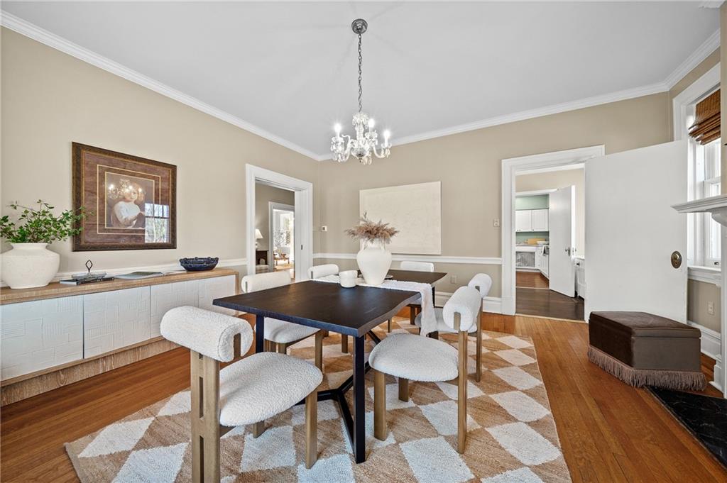 115 Woodland Road Pittsburgh, PA 15232 - Photo 14 of 50 a view of a dining room with furniture and wooden floor