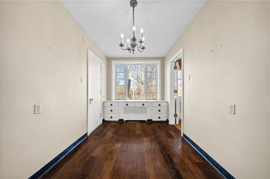 115 Woodland Road Pittsburgh, PA 15232 - Photo 16 of 50 a view of livingroom with hardwood floor and a ceiling fan