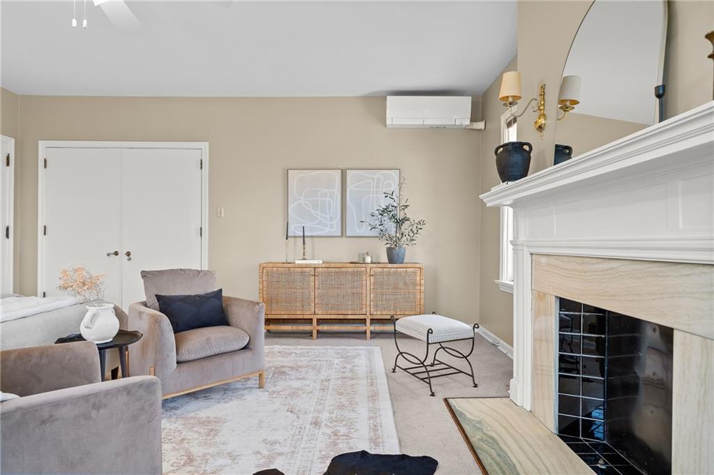 115 Woodland Road Pittsburgh, PA 15232 - Photo 27 of 50 a living room with furniture and a fireplace