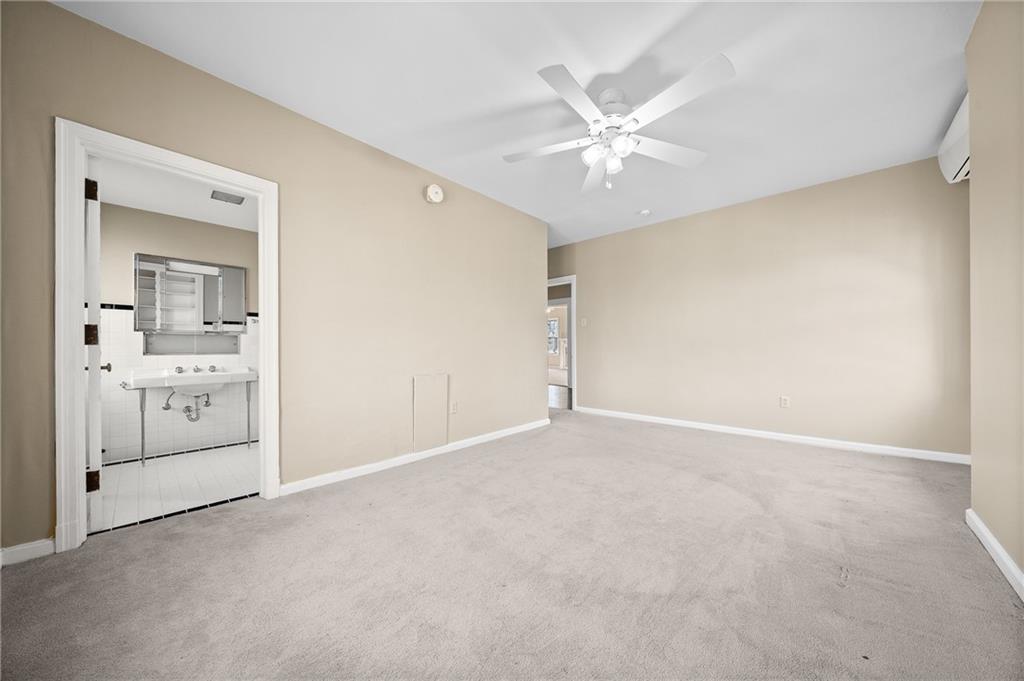 115 Woodland Road Pittsburgh, PA 15232 - Photo 39 of 50 a view of an empty room with a bathroom