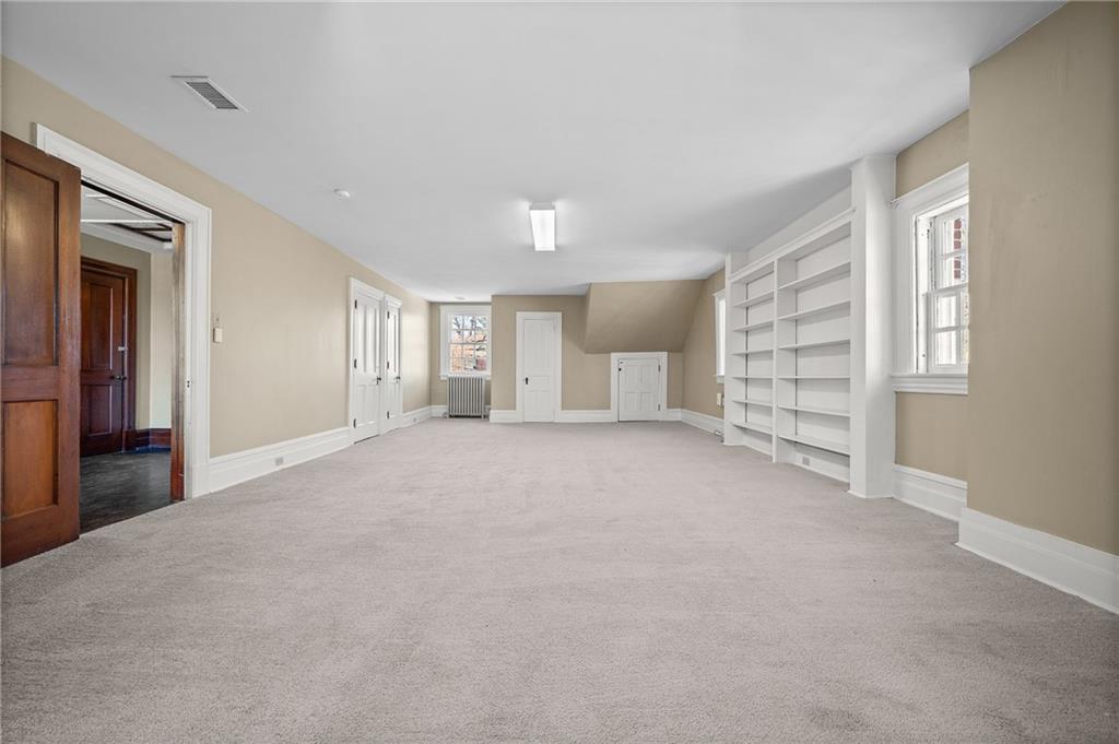 115 Woodland Road Pittsburgh, PA 15232 - Photo 42 of 50 a view of empty room with windows