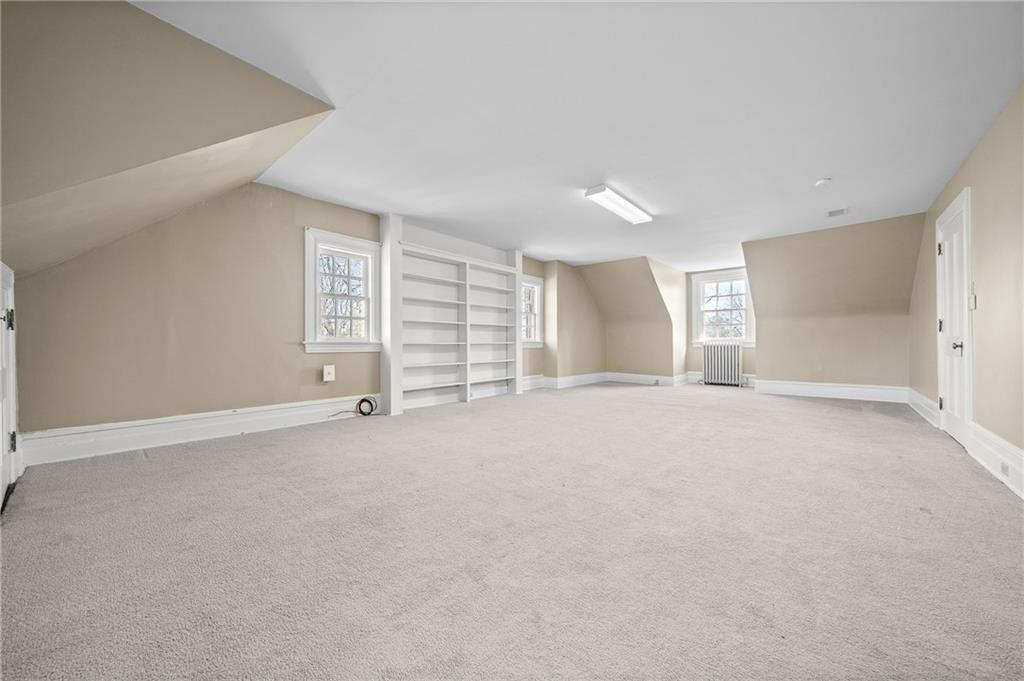 115 Woodland Road Pittsburgh, PA 15232 - Photo 43 of 50 a view of an empty room with a window