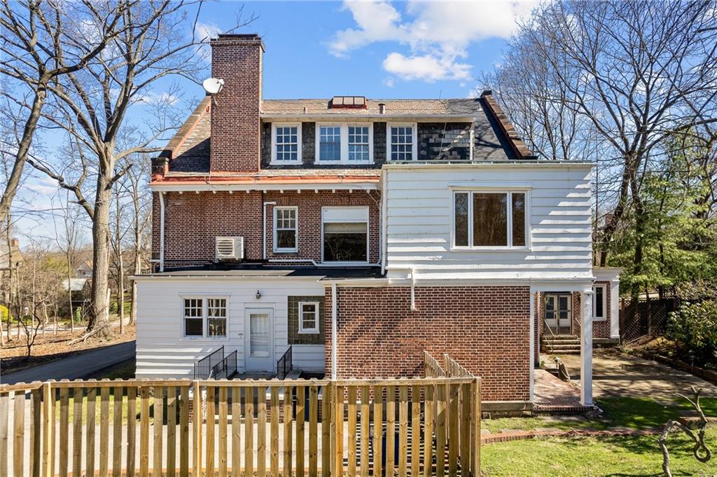 115 Woodland Road Pittsburgh, PA 15232 - Photo 48 of 50 a front view of a house with a yard