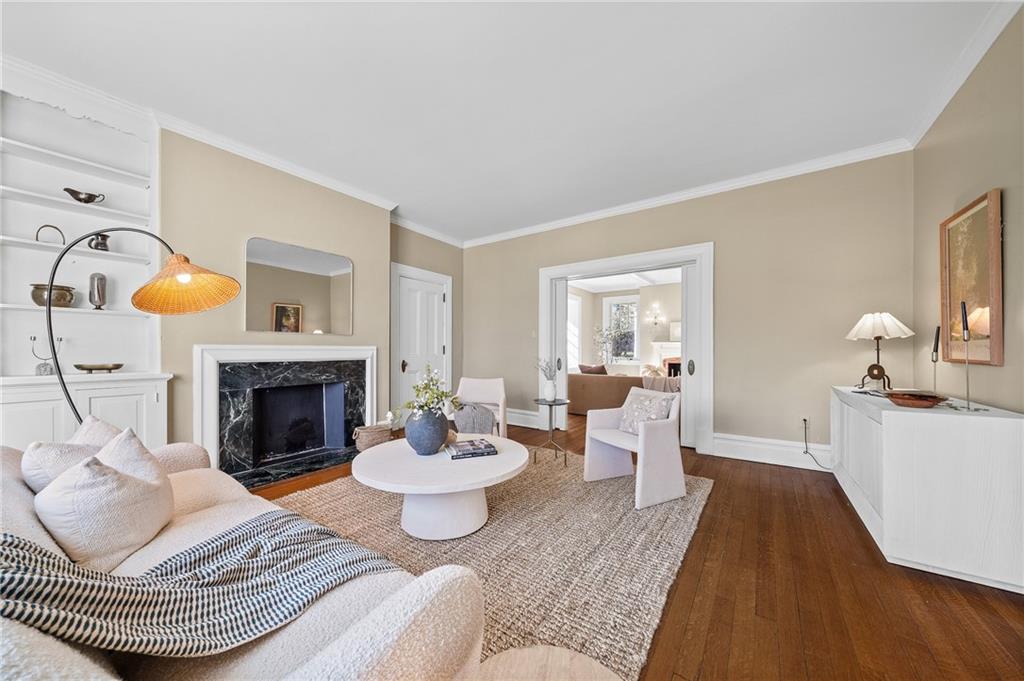 115 Woodland Road Pittsburgh, PA 15232 - Photo 7 of 50 a living room with furniture and a fireplace