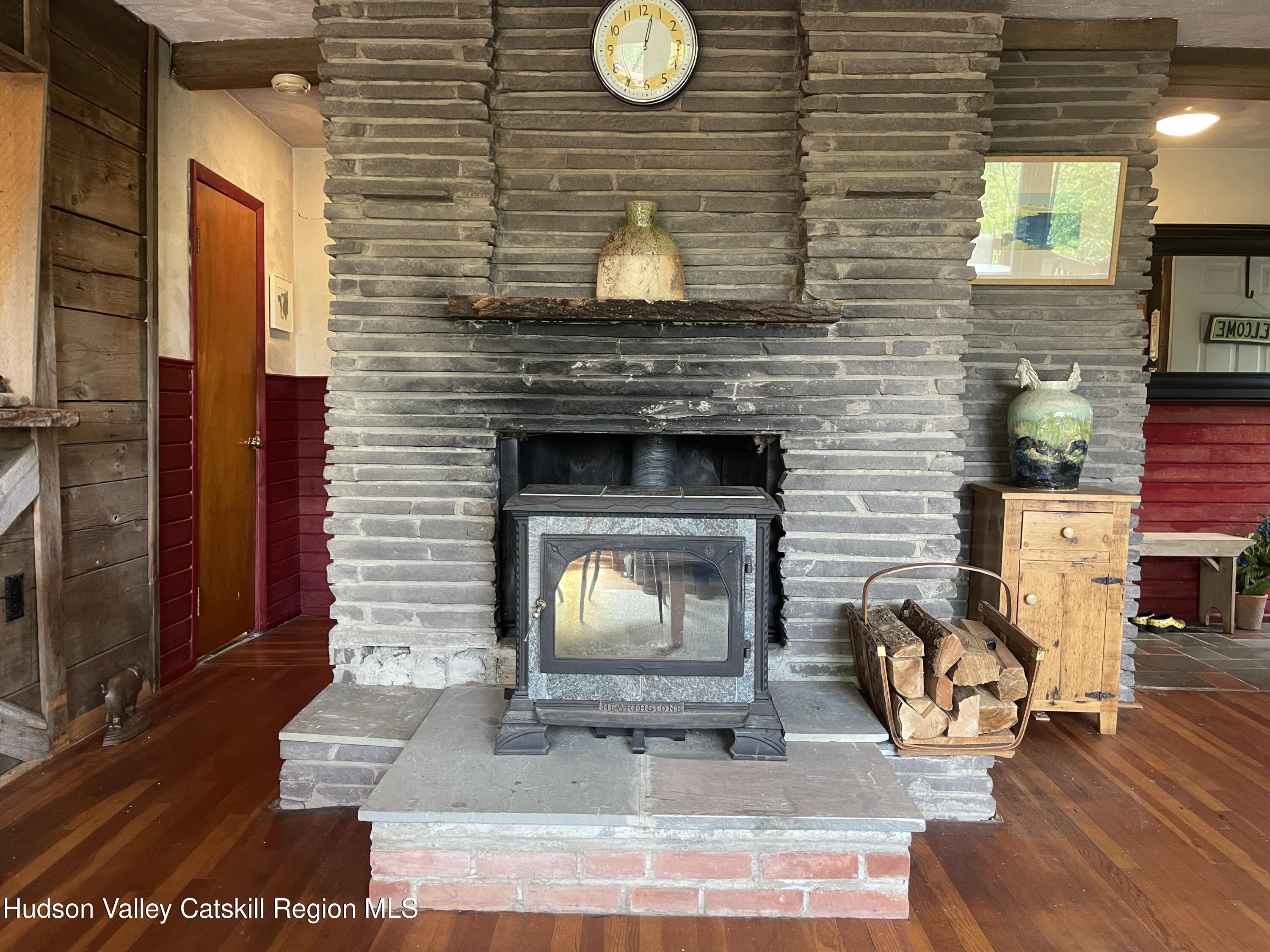 1011 West Settlement Road Roxbury, NY 12474 - Photo 27 of 32 IMG_0642 fireplace with wood