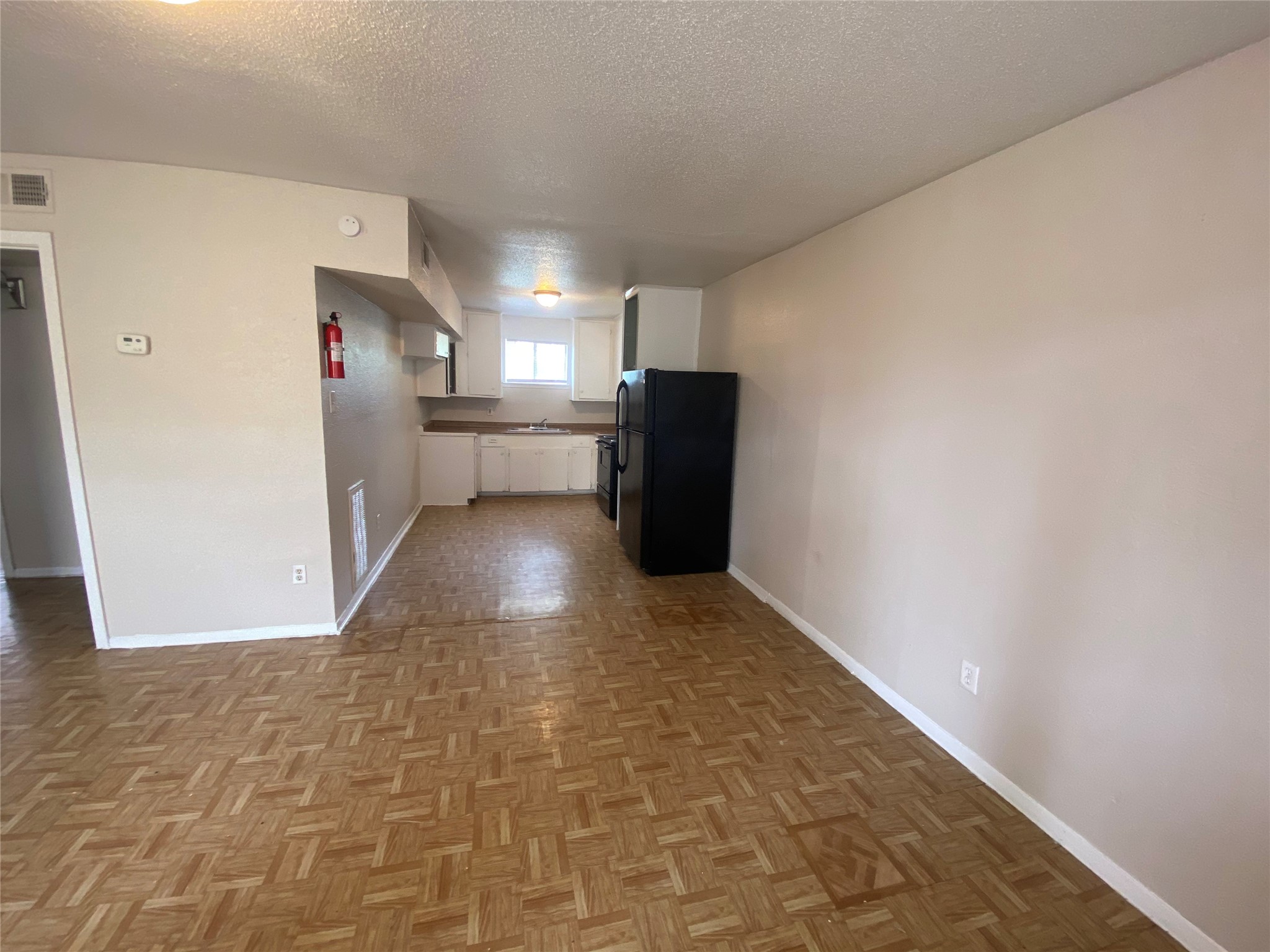 5610 Royal Palms Street, Unit 67 Houston, TX 77021 - Photo 3 of 11 a view of a storage & utility room with refrigerator