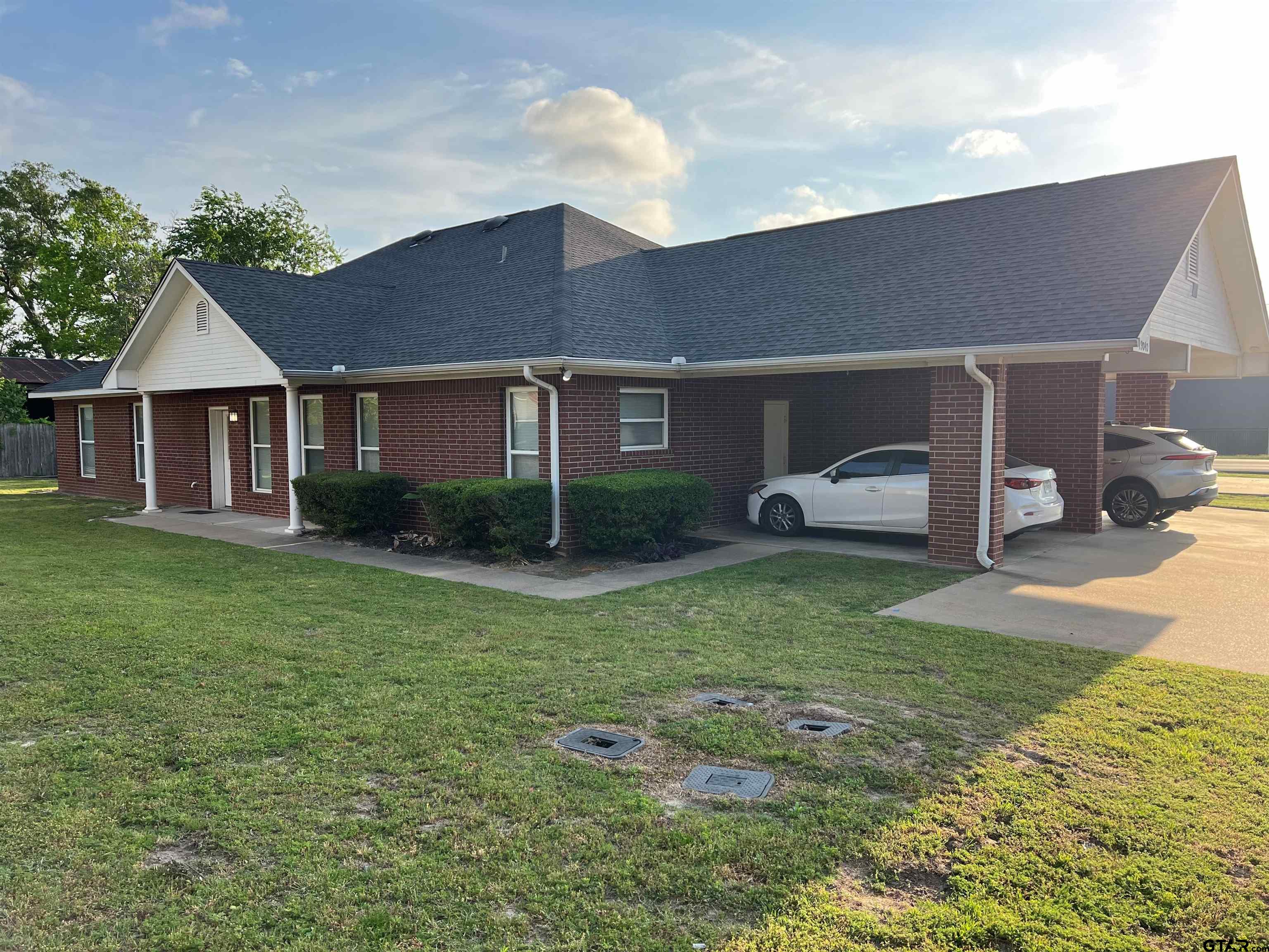 19040 FM 2493 Flint, TX 75762 - Photo 1 of 18 a front view of house with yard and green space