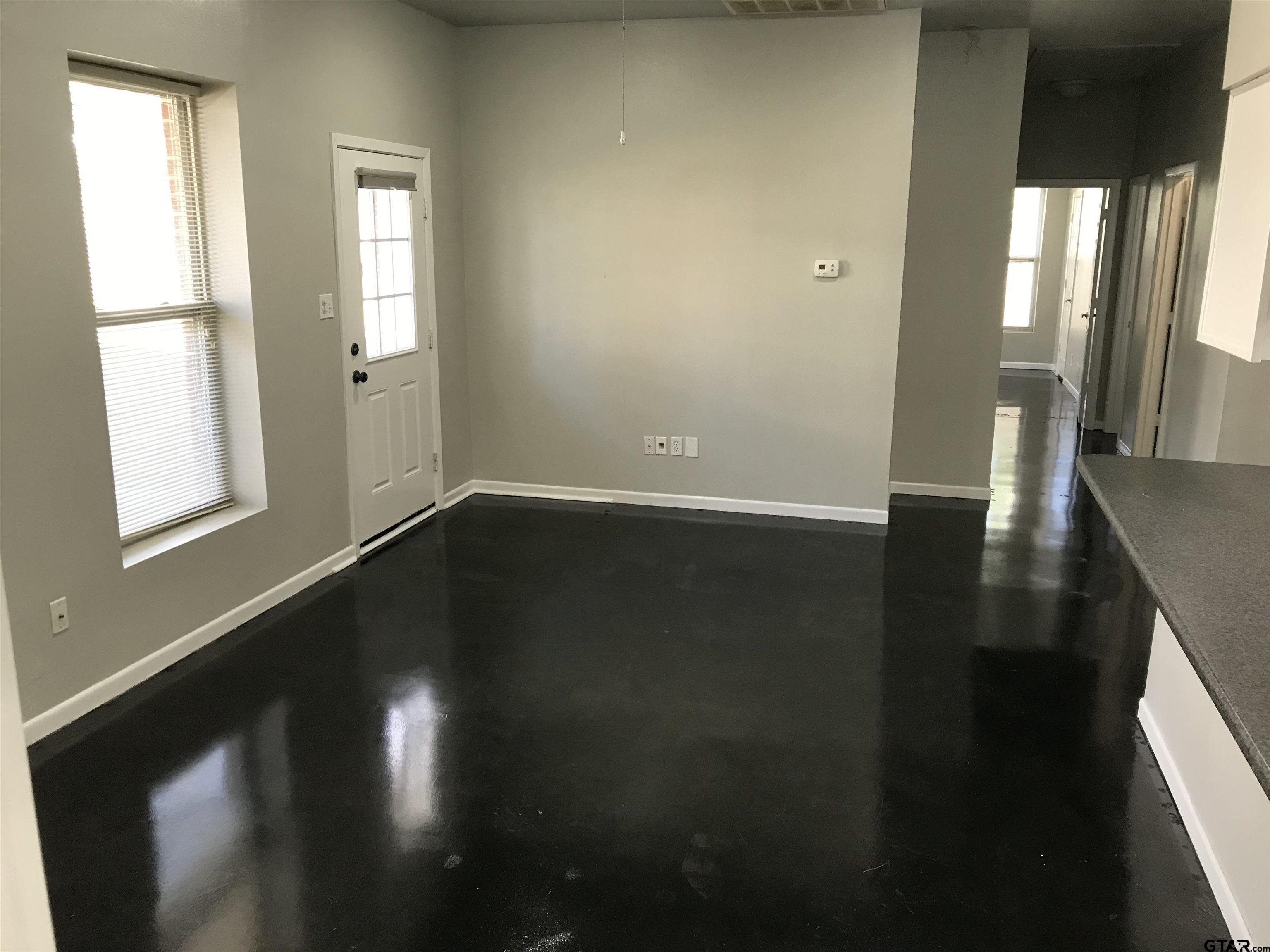 19040 FM 2493 Flint, TX 75762 - Photo 3 of 18 wooden floor in an empty room with a window