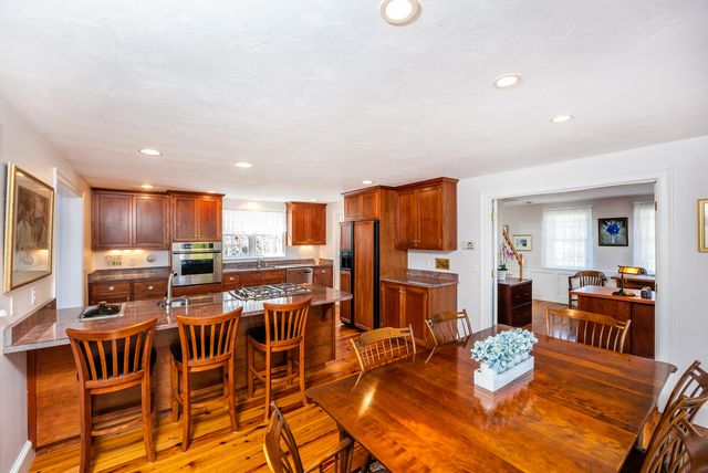 a view of a living room and dining room