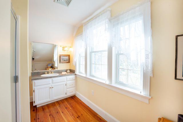 a close view of a sink and a window