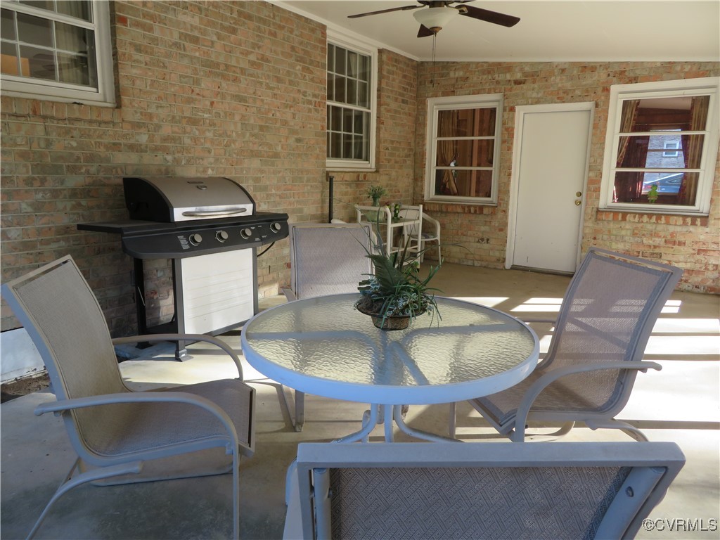 4612 Fairway Road Petersburg, VA 23803 - Photo 15 of 50 a living room with dining table and chairs