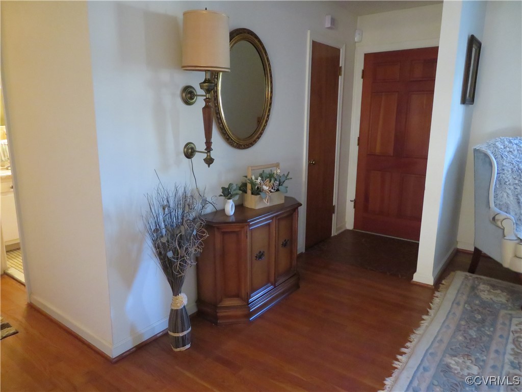 4612 Fairway Road Petersburg, VA 23803 - Photo 18 of 50 a bedroom with furniture and a mirror