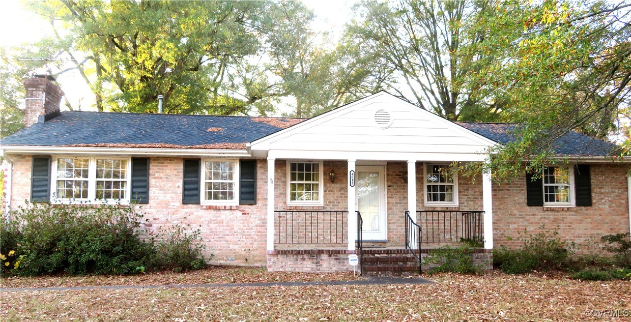 4612 Fairway Road Petersburg, VA 23803 - Photo 2 of 50 a front view of a house with a garden