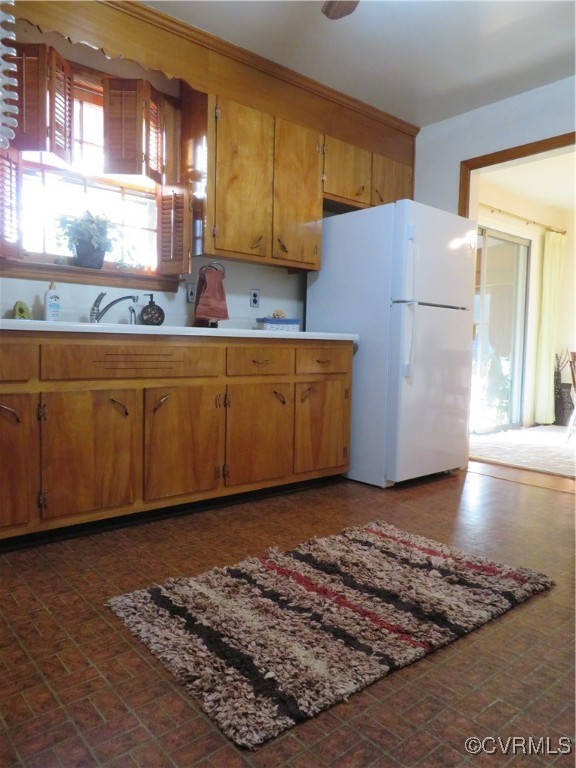 4612 Fairway Road Petersburg, VA 23803 - Photo 29 of 50 a kitchen with stainless steel appliances granite countertop a refrigerator sink and cabinets