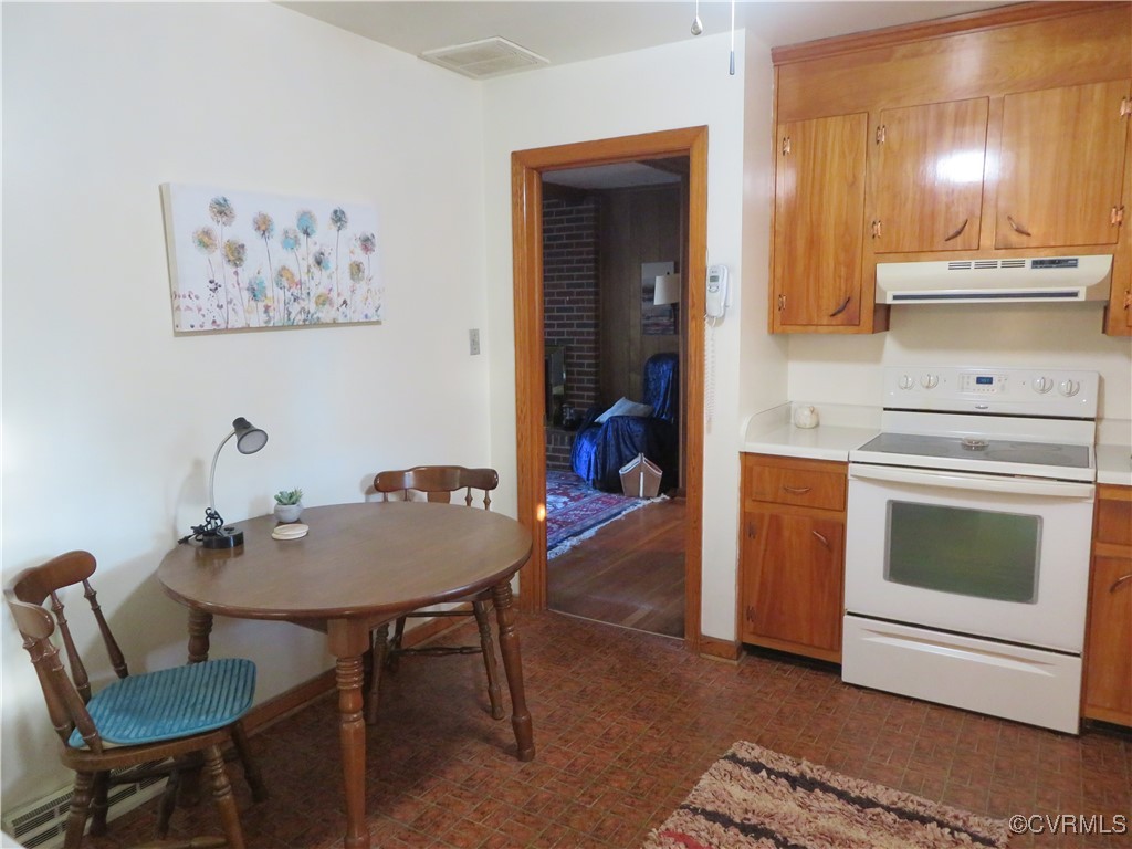 4612 Fairway Road Petersburg, VA 23803 - Photo 30 of 50 a view of a kitchen area with furniture and wooden floor