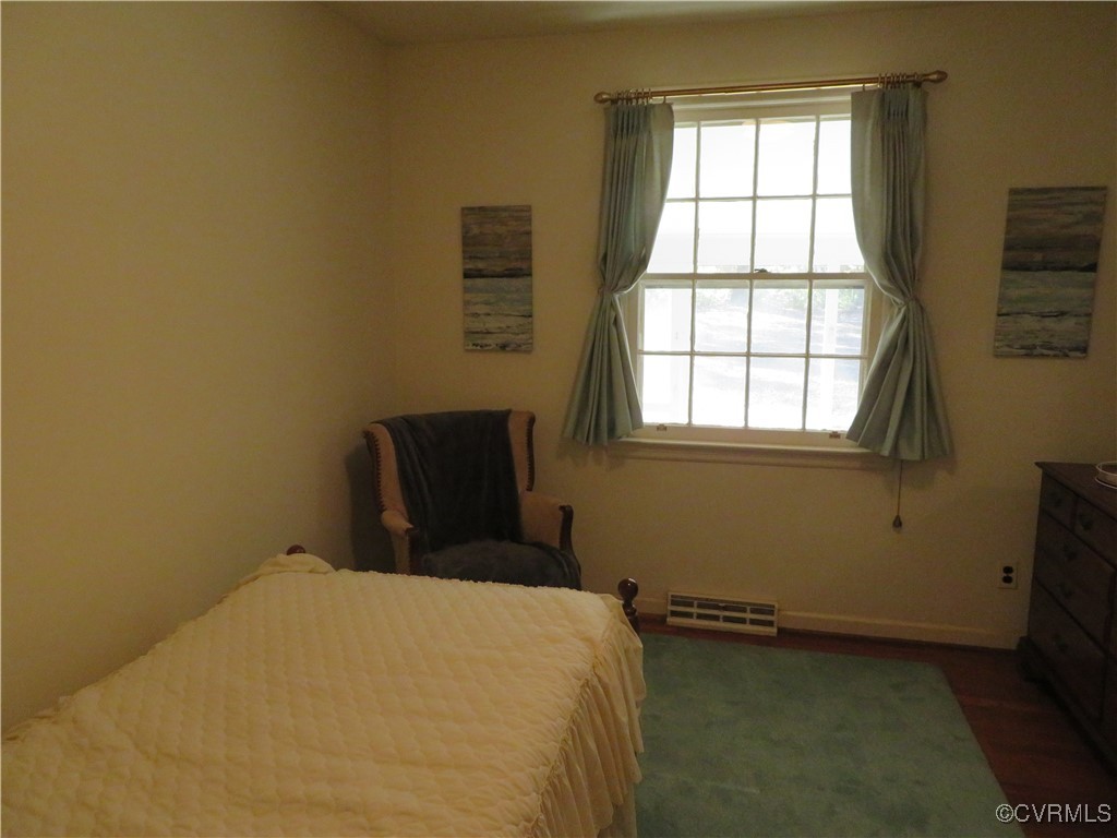 4612 Fairway Road Petersburg, VA 23803 - Photo 39 of 50 a bedroom with a bed and a window