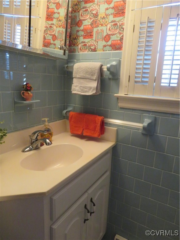 4612 Fairway Road Petersburg, VA 23803 - Photo 49 of 50 a bathroom with a sink and a mirror