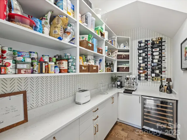 a kitchen with a cabinets and window