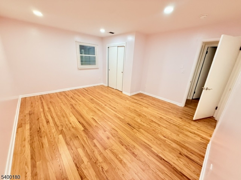 6 Hillside Avenue Netcong, NJ 07857 - Photo 11 of 28 a bedroom with a bed and a mirror