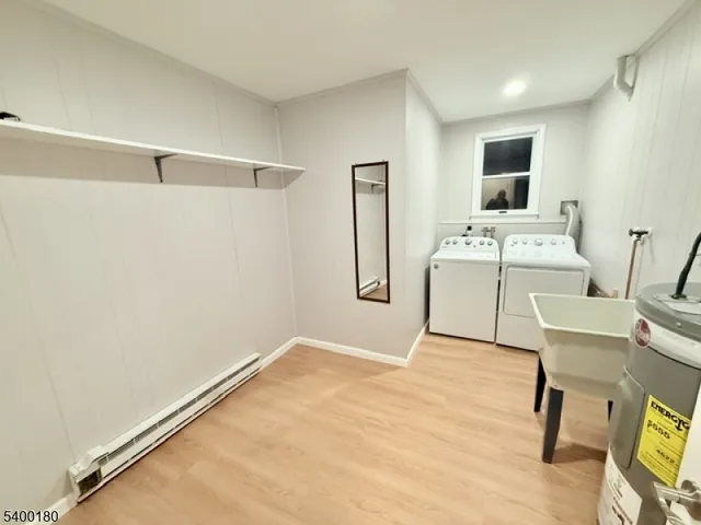 a workspace with a wooden floor and a window