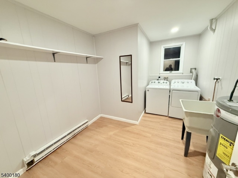 6 Hillside Avenue Netcong, NJ 07857 - Photo 3 of 26 a workspace with a wooden floor and a window