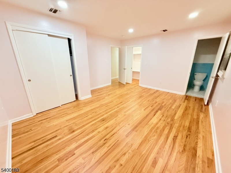 6 Hillside Avenue Netcong, NJ 07857 - Photo 9 of 26 a bedroom with a bed and a mirror