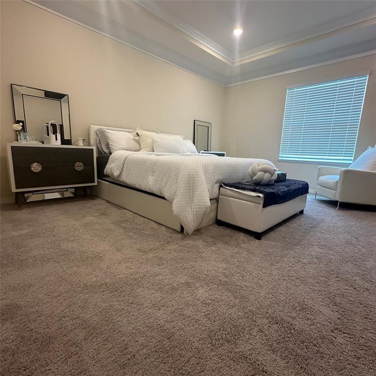 12304 Southwest Forli Way Port St. Lucie, FL 34987 - Photo 14 of 26 a spacious bedroom with a bed and a couch