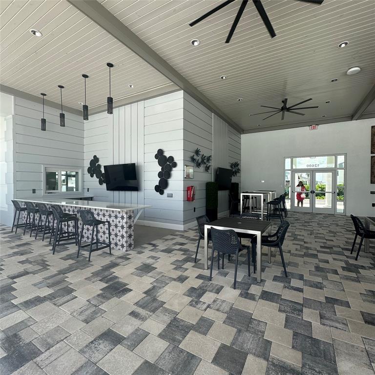12304 Southwest Forli Way Port St. Lucie, FL 34987 - Photo 21 of 26 a view of a dining area with furniture