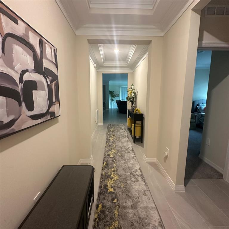 12304 Southwest Forli Way Port St. Lucie, FL 34987 - Photo 4 of 26 a view of hallway with livingroom and stairs