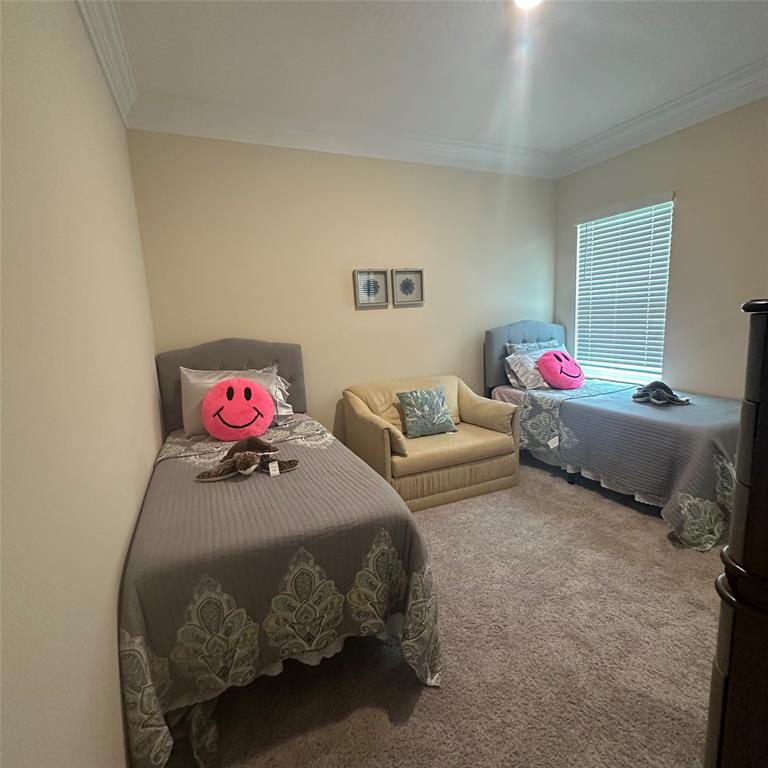12304 Southwest Forli Way Port St. Lucie, FL 34987 - Photo 6 of 26 a bedroom with bed and a couch