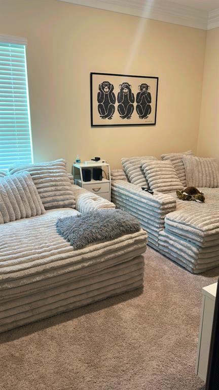 12304 Southwest Forli Way Port St. Lucie, FL 34987 - Photo 9 of 26 a bedroom with a bed and a couch