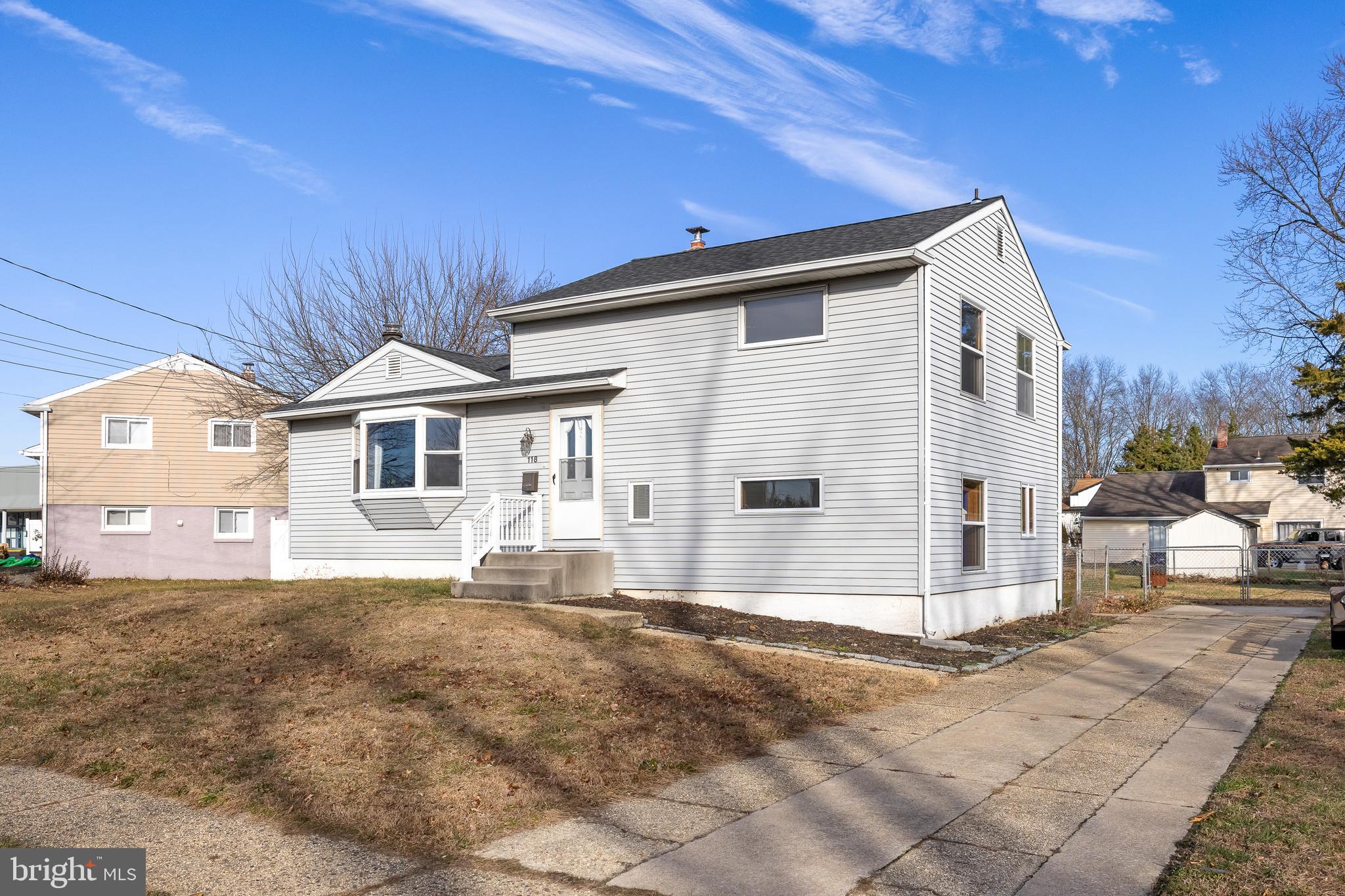 118 Somerset Road Glassboro, NJ 08028 - Photo 2 of 7 a view of a house with a backyard