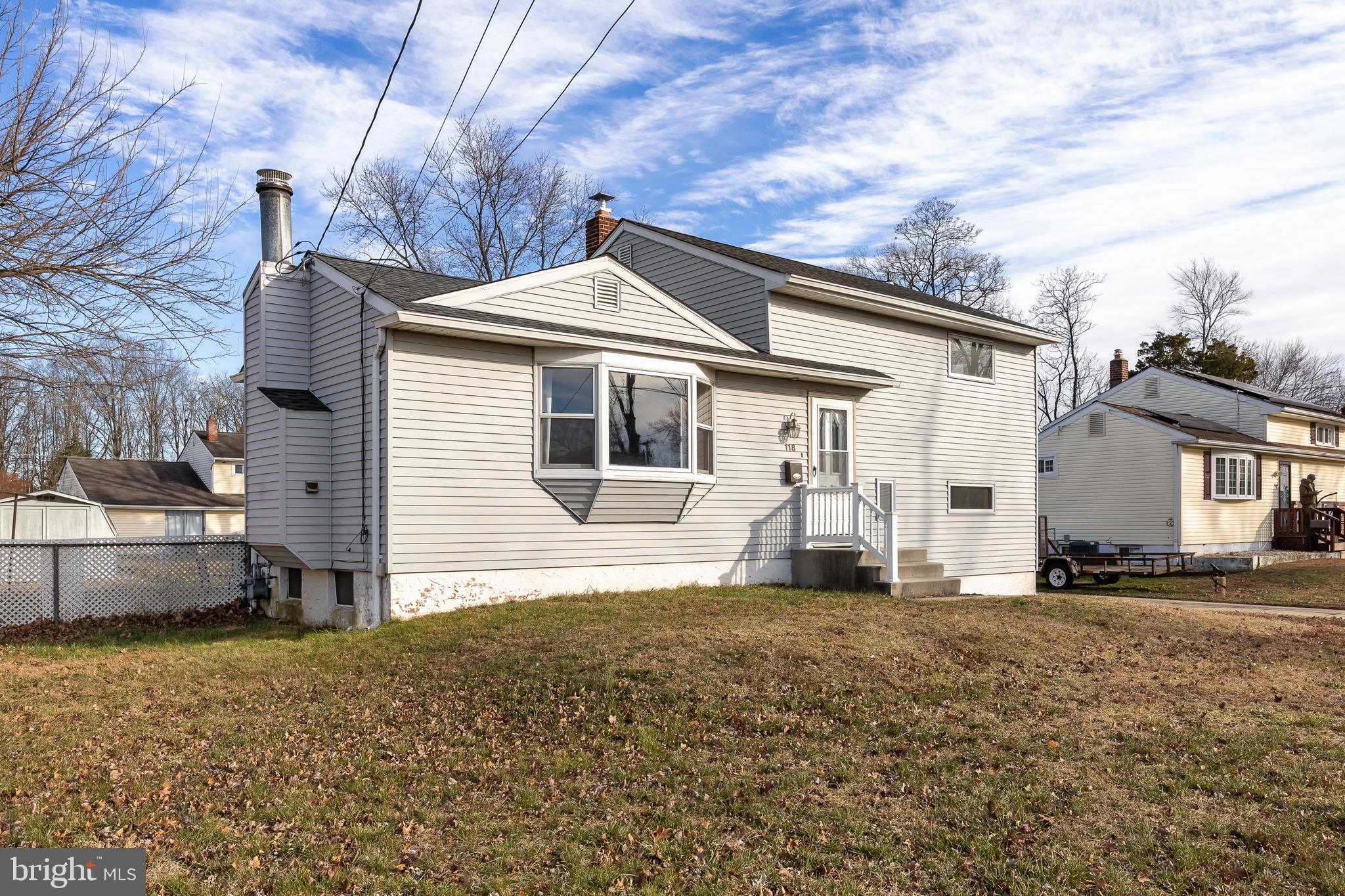 118 Somerset Road Glassboro, NJ 08028 - Photo 3 of 7 a front view of a house with a yard