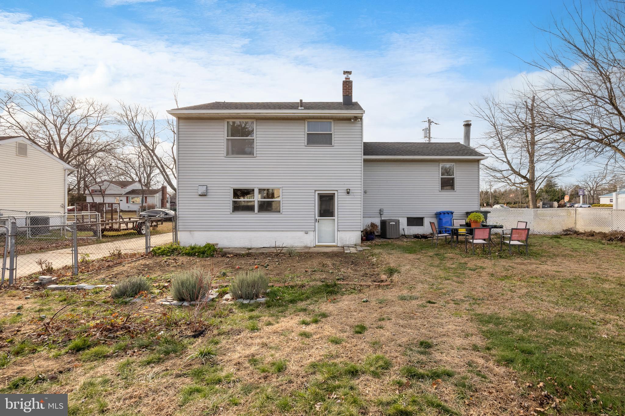 118 Somerset Road Glassboro, NJ 08028 - Photo 4 of 7 a view of a house with a yard