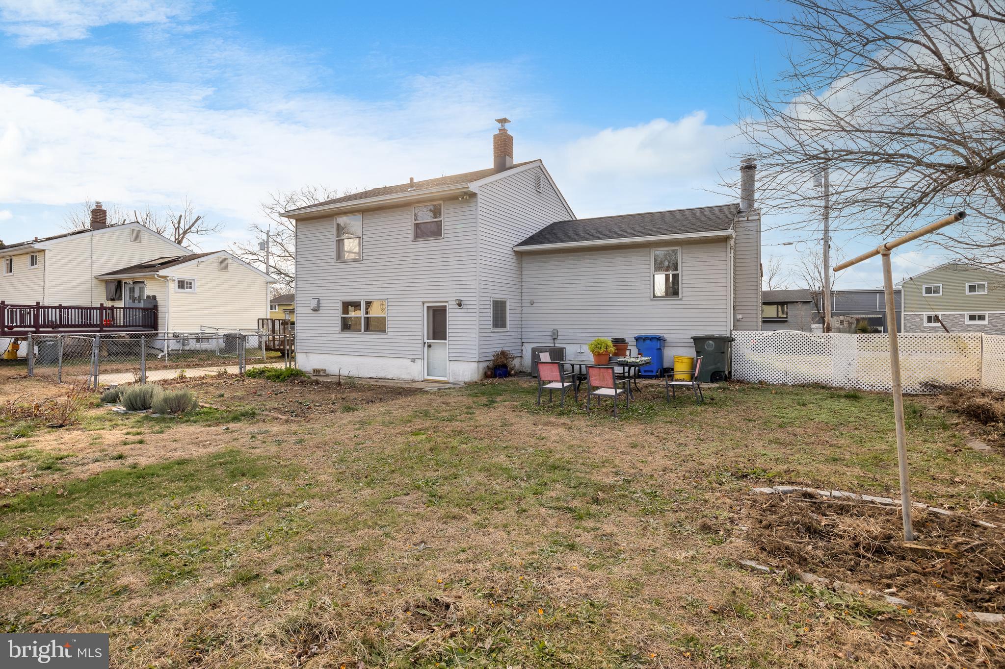 118 Somerset Road Glassboro, NJ 08028 - Photo 5 of 7 a backyard of a house with table and chairs