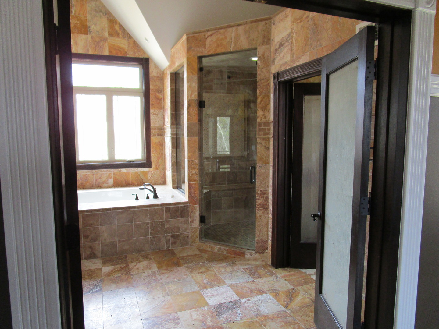 6909 Schultz Road Harvard, IL 60033 - Photo 14 of 19 a bathroom with a bathtub and a shower