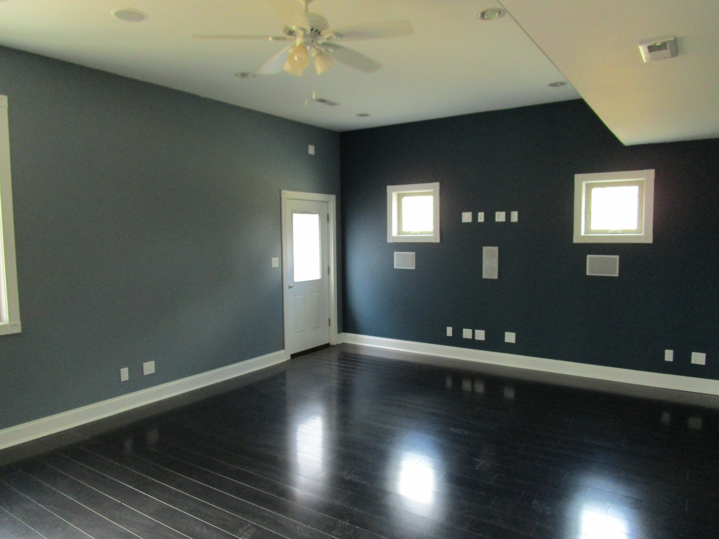 6909 Schultz Road Harvard, IL 60033 - Photo 18 of 19 an empty room with wooden floor and windows