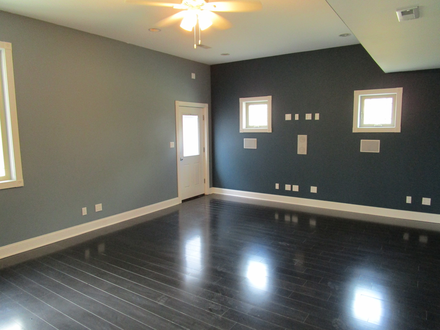 6909 Schultz Road Harvard, IL 60033 - Photo 19 of 19 a view of an empty room with wooden floor and a window