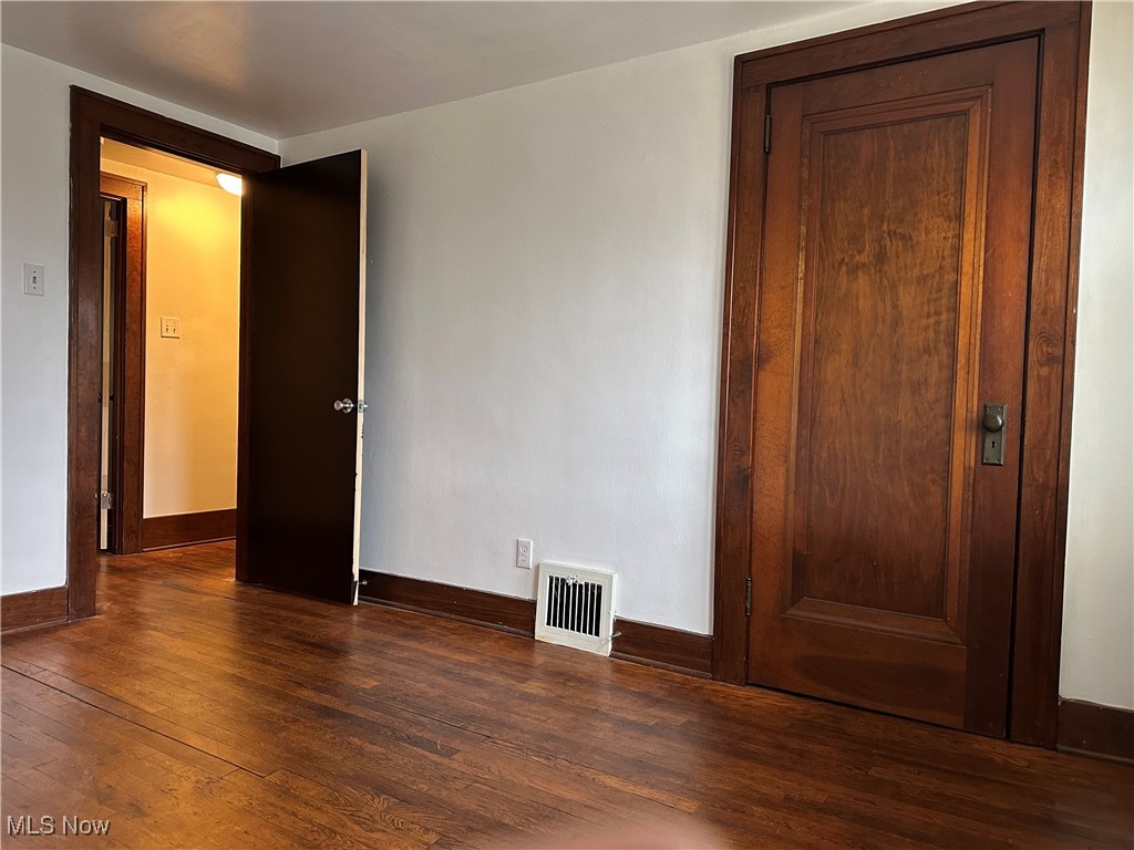 7954 Warren - Sharon Road Masury, OH 44438 - Photo 22 of 28 Unfurnished bedroom with dark wood-style floors