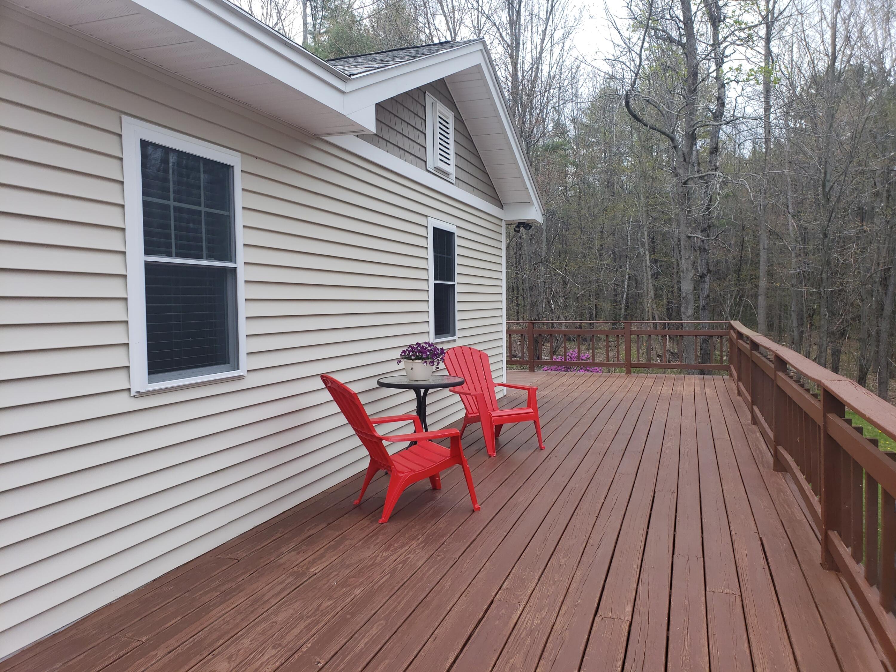335 Blackguard Road Waterford, ME 04088 - Photo 8 of 35 rear deck of wrap a round
