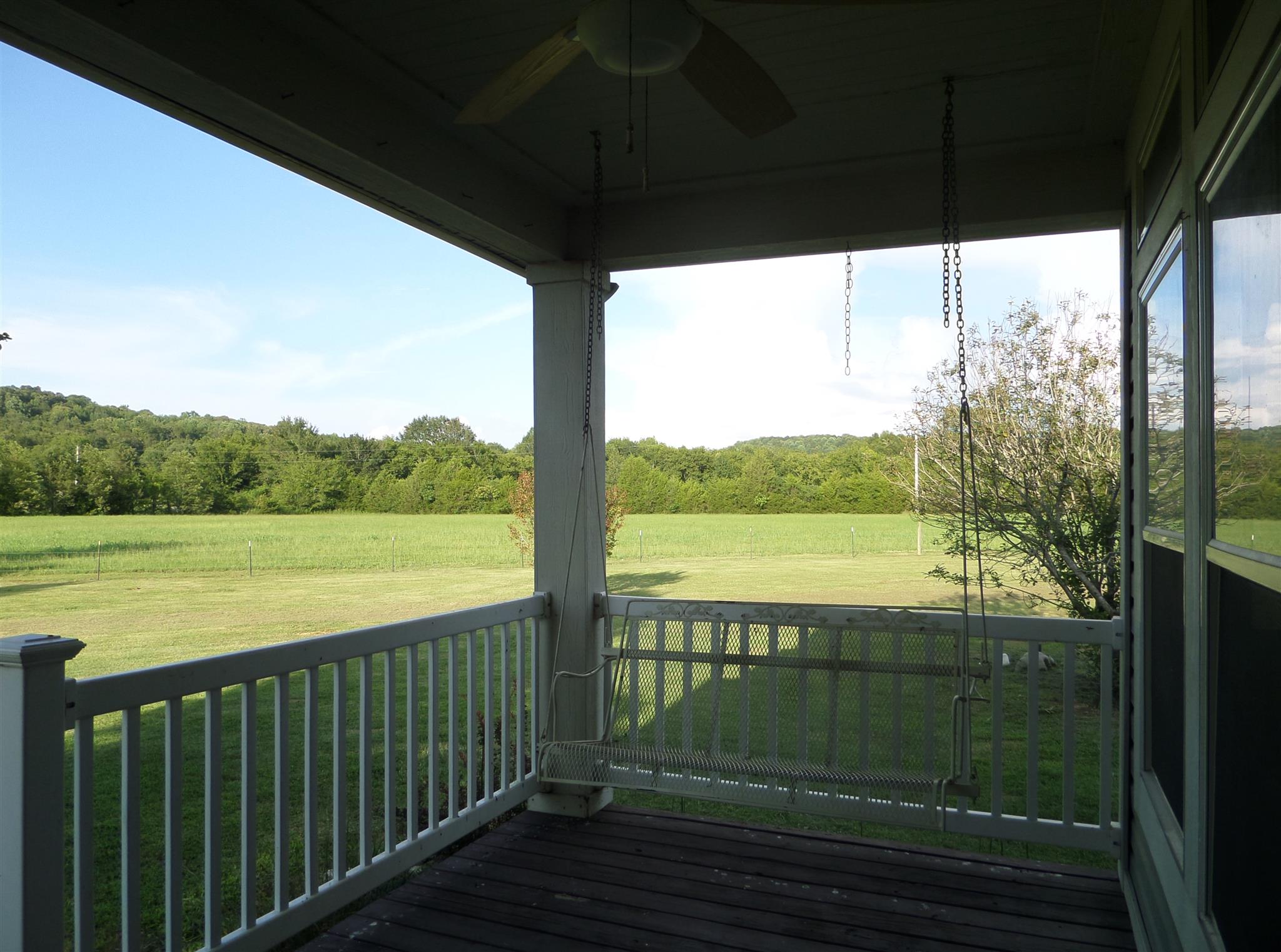 855 Cut Off Road Pulaski, TN 38478 - Photo 5 of 26 a view of a balcony with lake and mountain view